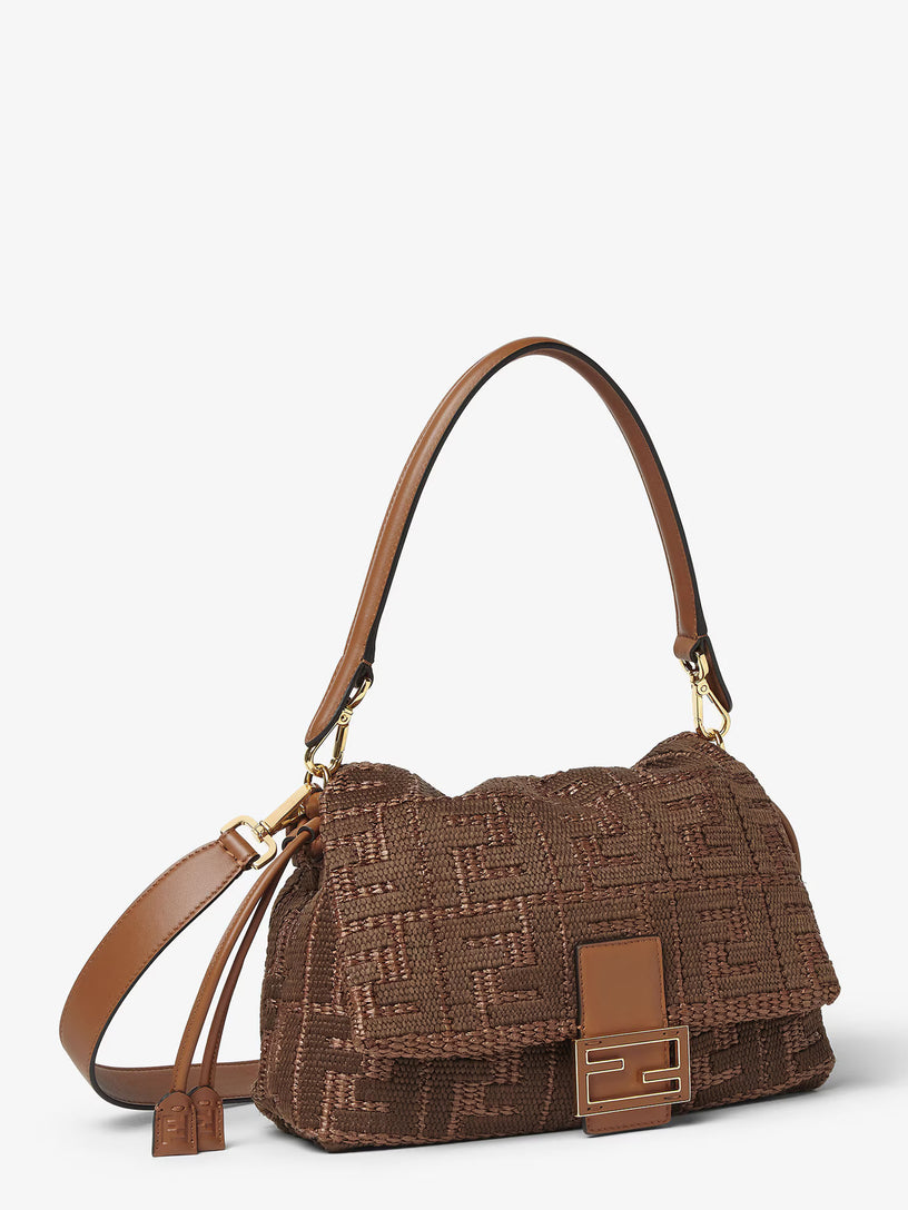 <H1 class=product-name style="BOX-SIZING: border-box; FONT-FAMILY: Georgia, sans-serif; FONT-WEIGHT: normal; MARGIN: 0px; LETTER-SPACING: -0.02em" kl-name="Mamma Baguette Medium Sellier brown raffia-effect material woven bag with FF embroidery" itemprop="name">Mamma Baguette Medium</H1>
<BR class=Apple-interchange-newline>
