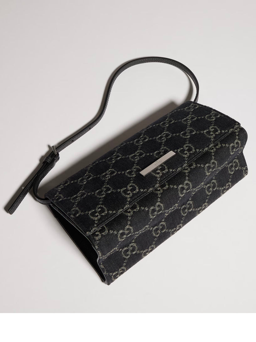 Pouch piccola con cinturino e placca Gucci