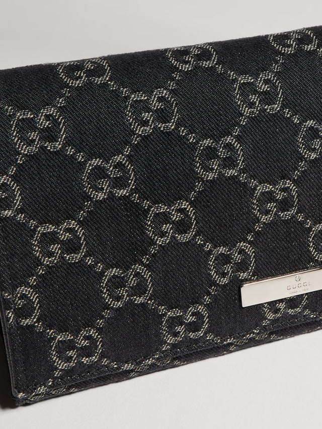 Small pouch with strap and Gucci plaque
