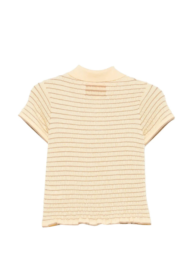 Polo arricciata aderente