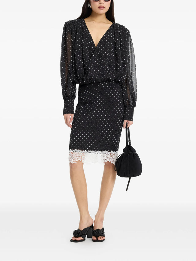 Blusa a maniche lunghe arricciate