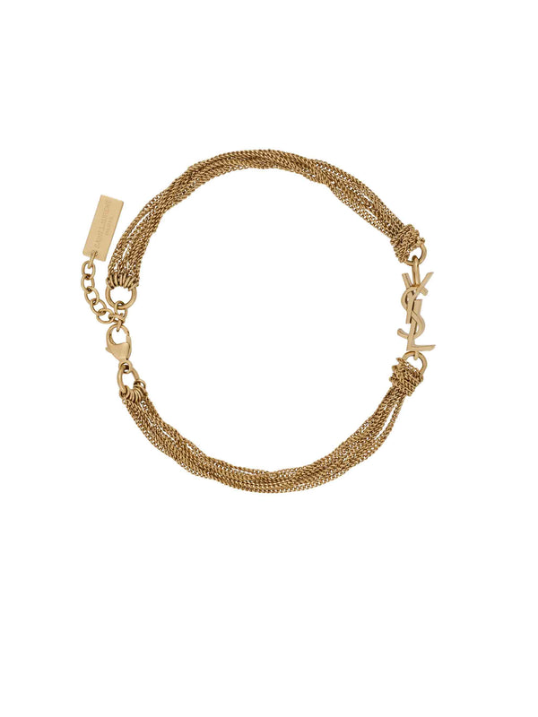 Bracciale in metallo con nappina CASSANDRE