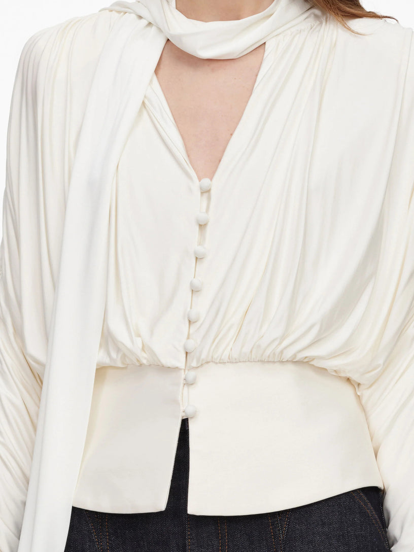 Top con fiocco al collo