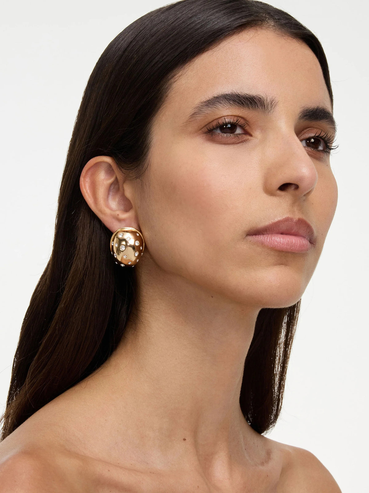 Orecchini curvi in oro con cristalli