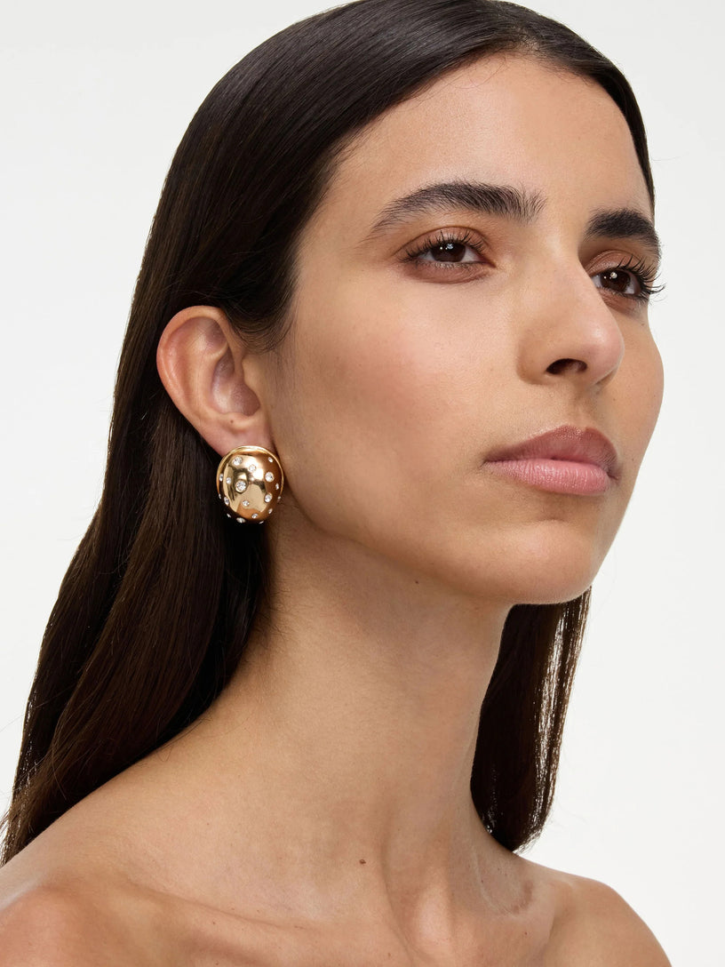 Orecchini curvi in oro con cristalli