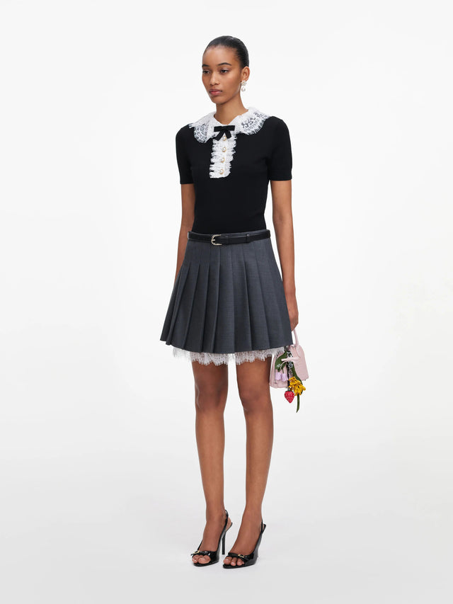 Top in maglia con colletto in pizzo