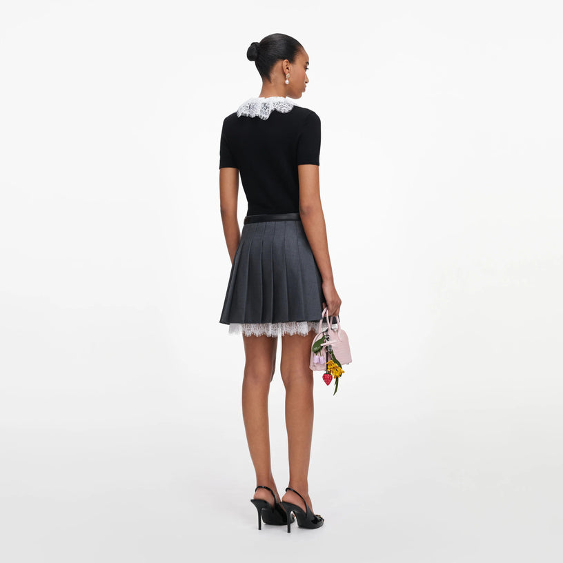 Top in maglia con colletto in pizzo