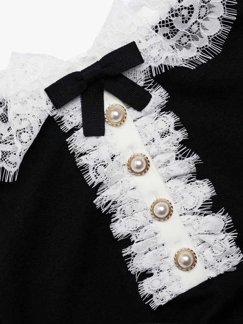 Top in maglia con colletto in pizzo