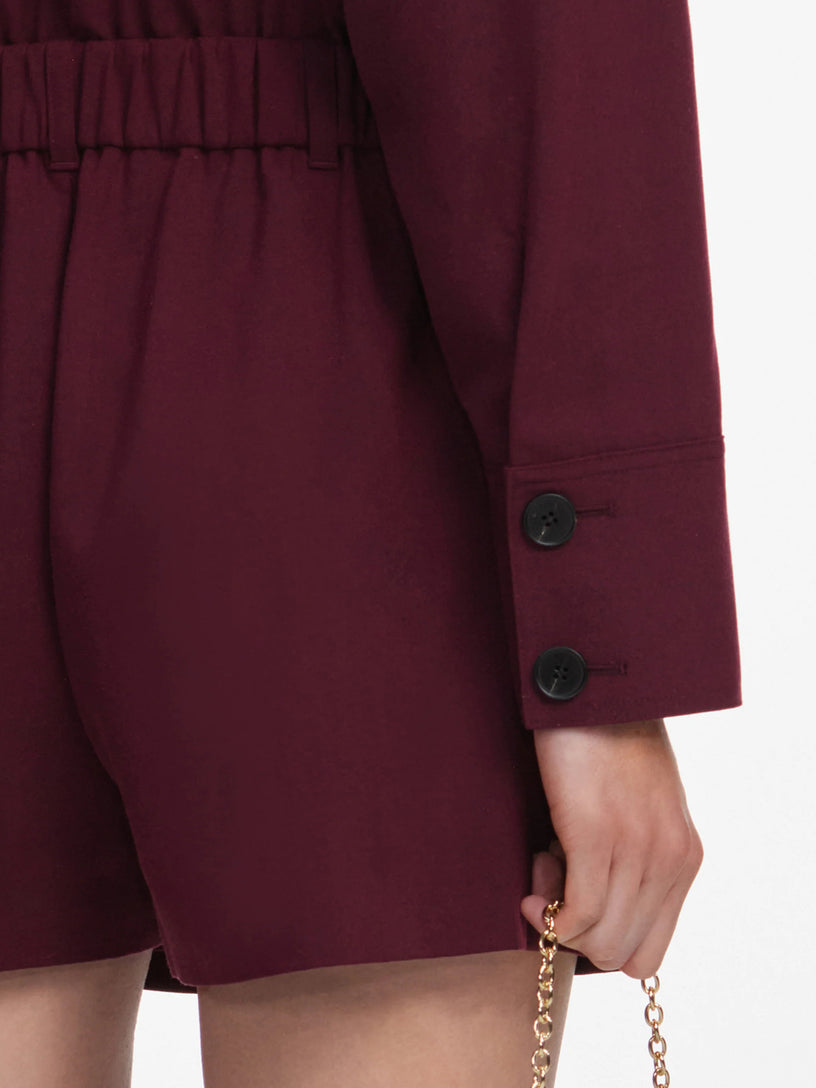 Tutina corta in twill con fiocco al collo