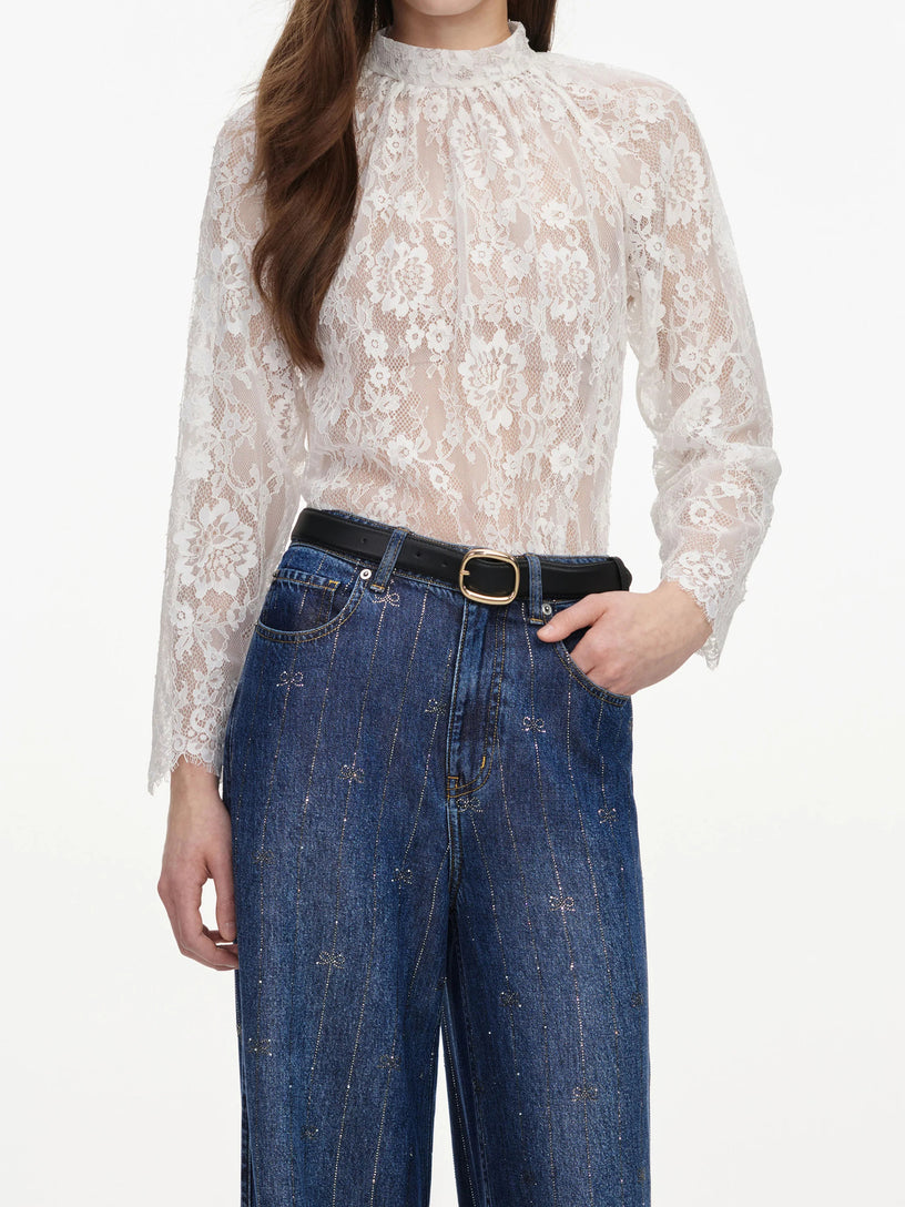 Jeans in denim con strisce di strass