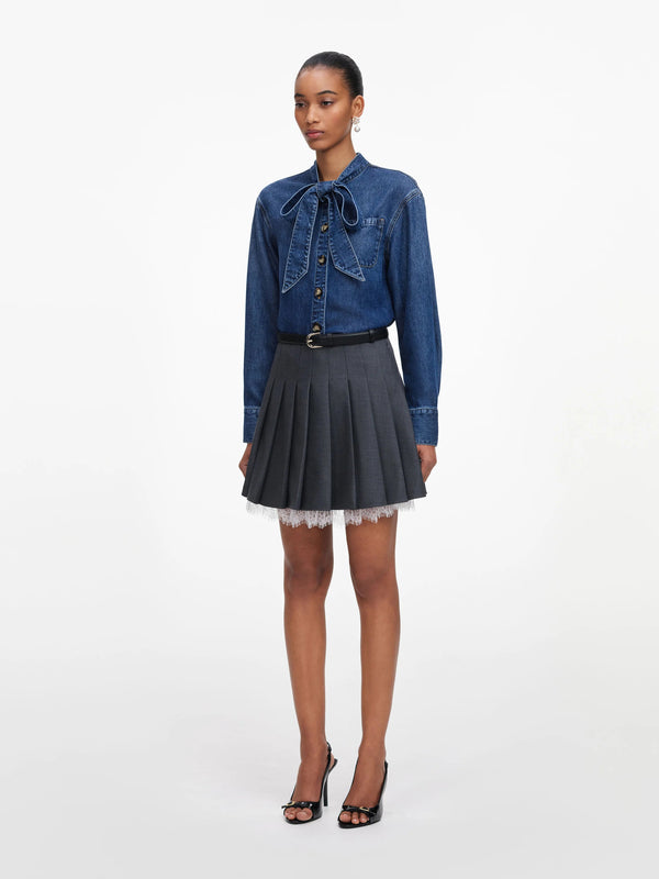 Camicia in denim con laccetti al collo