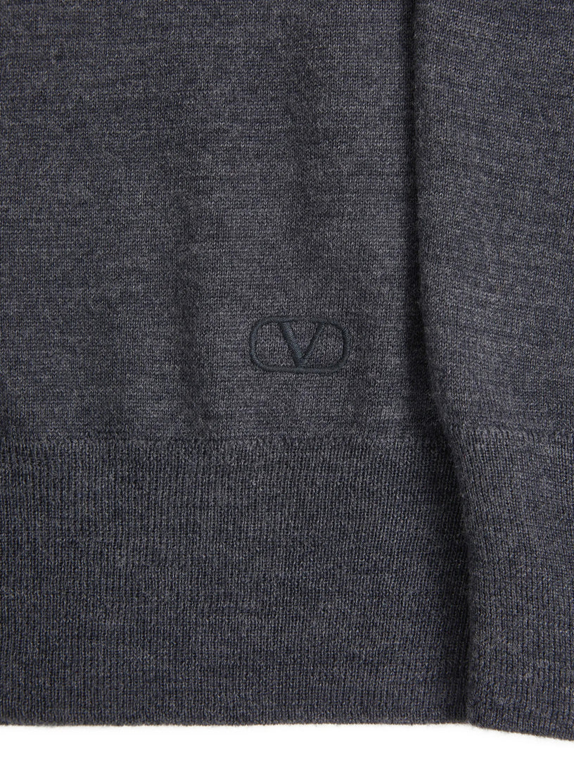 Polo in lana con ricamo VLogo
