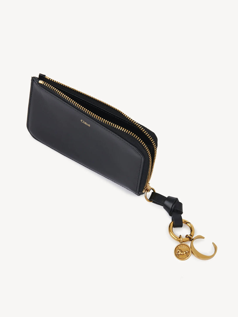 Alphabet coin purse in shiny leather