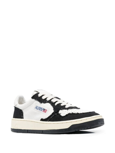 Medalist low sneakers in leather and canvas