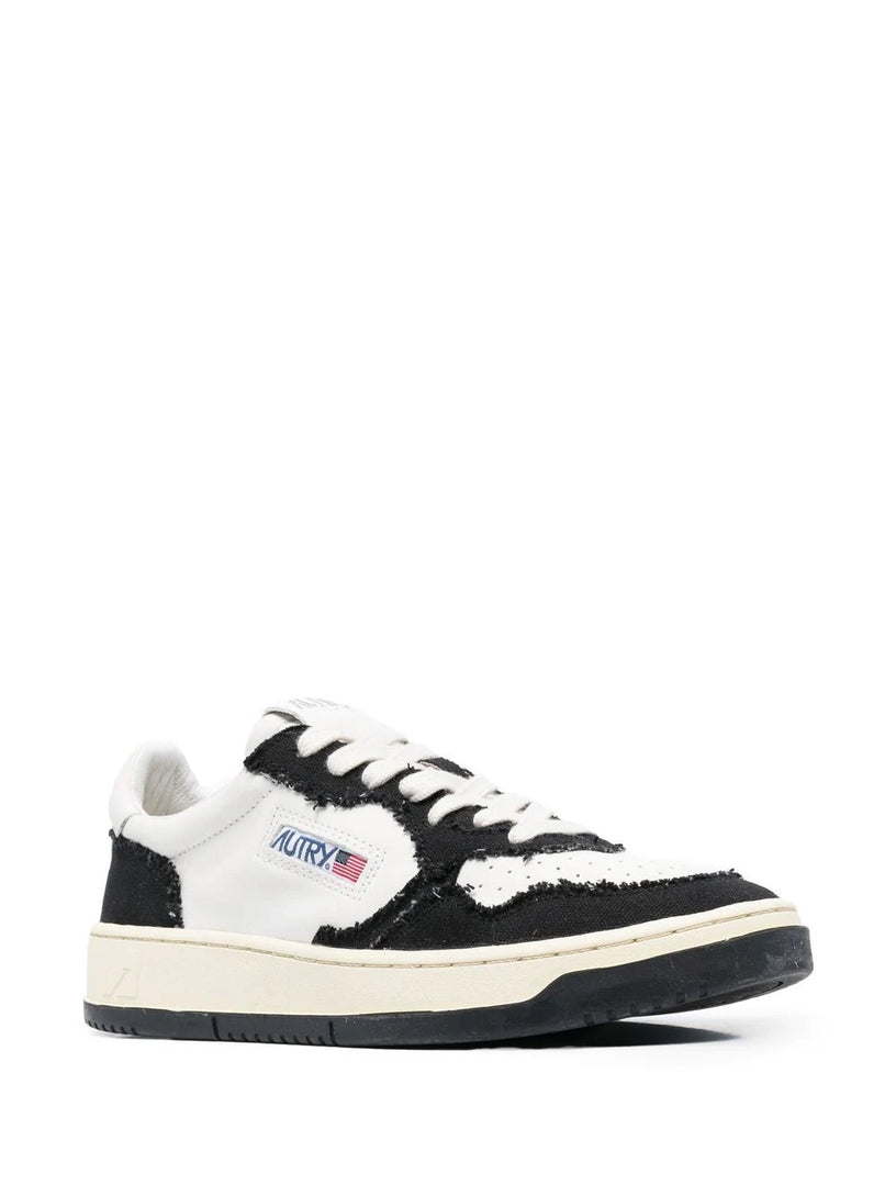 Medalist low sneakers in leather and canvas