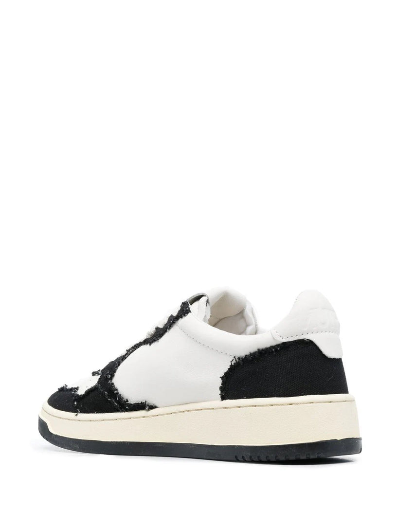 Medalist low sneakers in leather and canvas