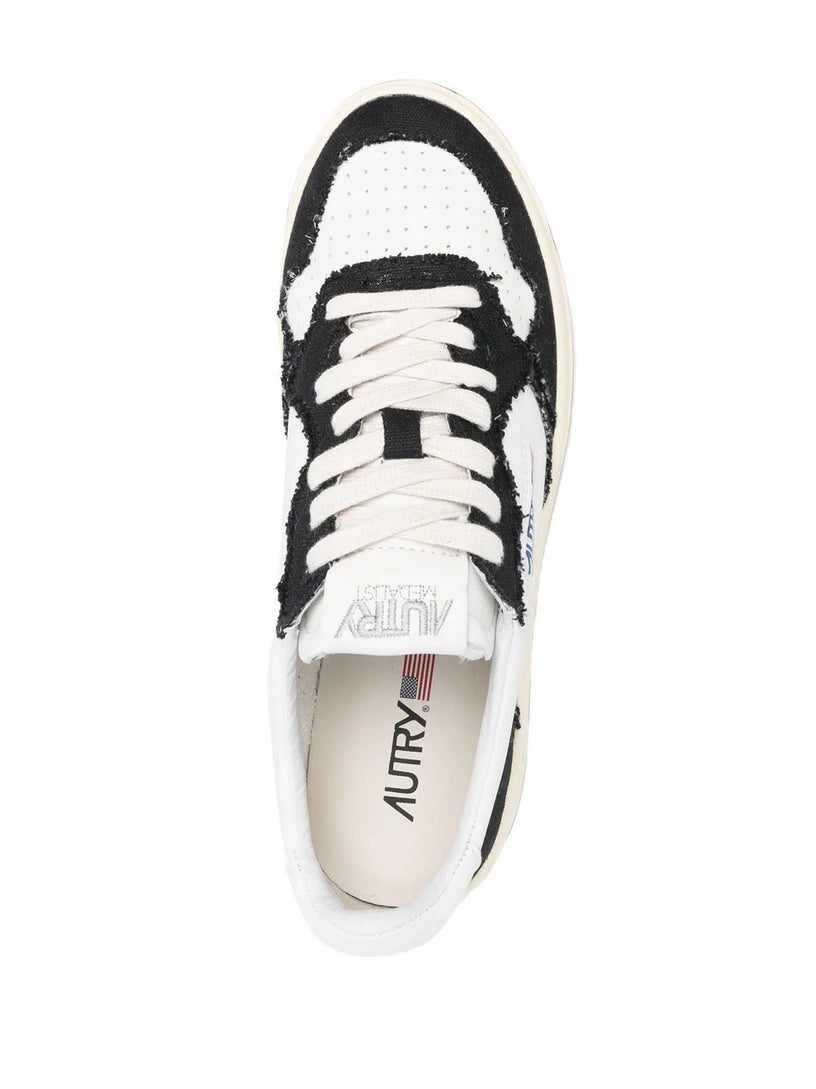 Medalist low sneakers in leather and canvas