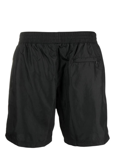 Mid-length swim trunks with branded plate
