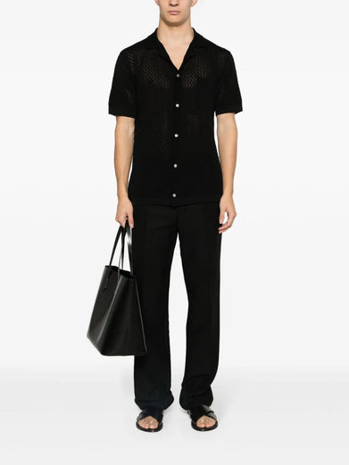 Knitted shirt with pointed collar