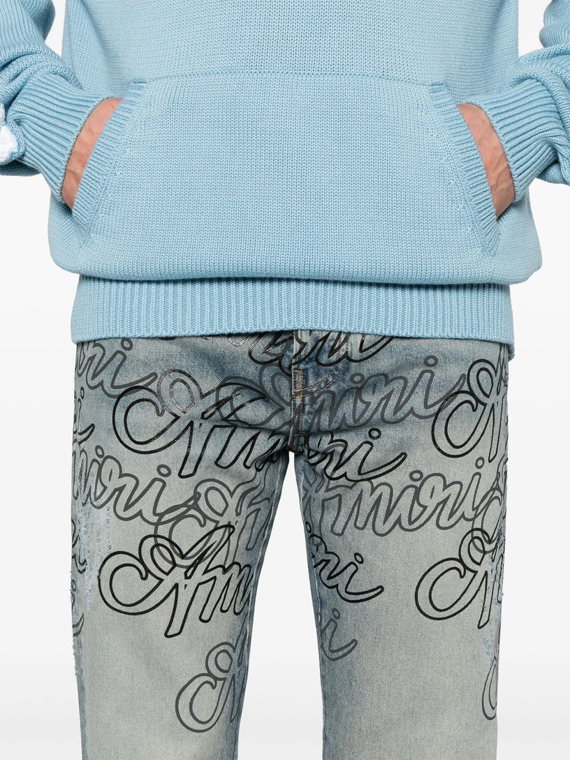 Jeans overlay Amiri script