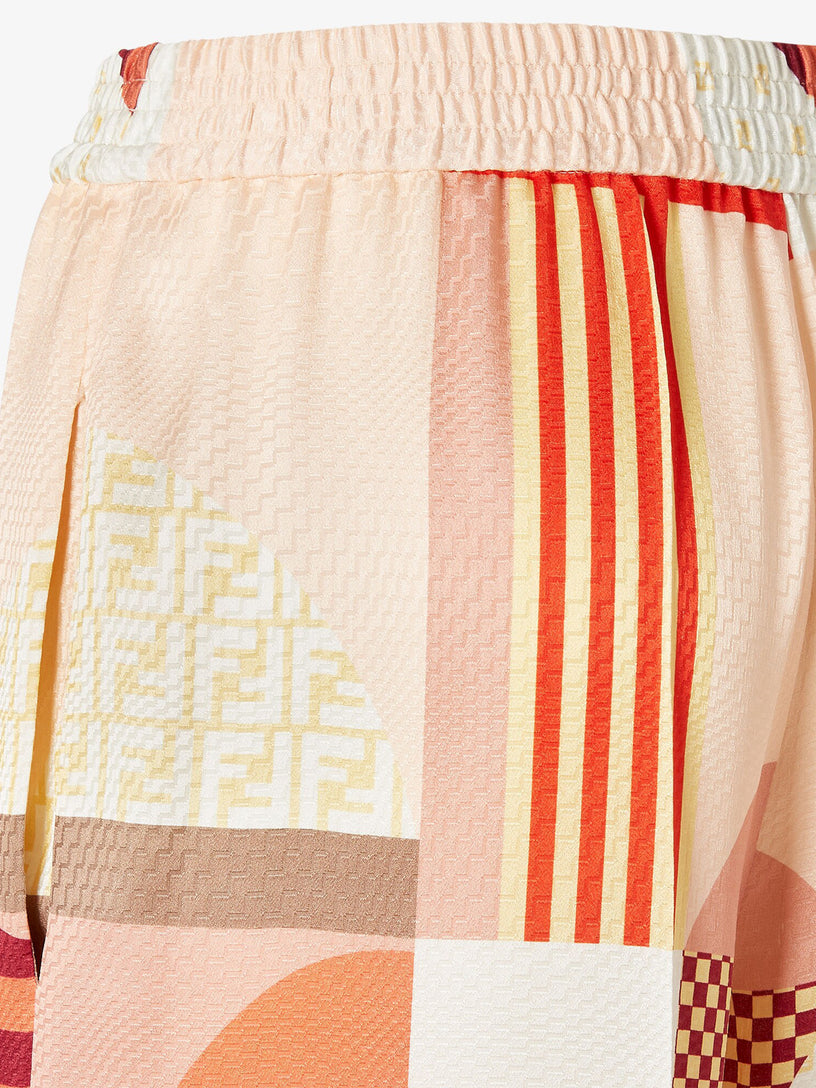 Silk trousers with patchwork print