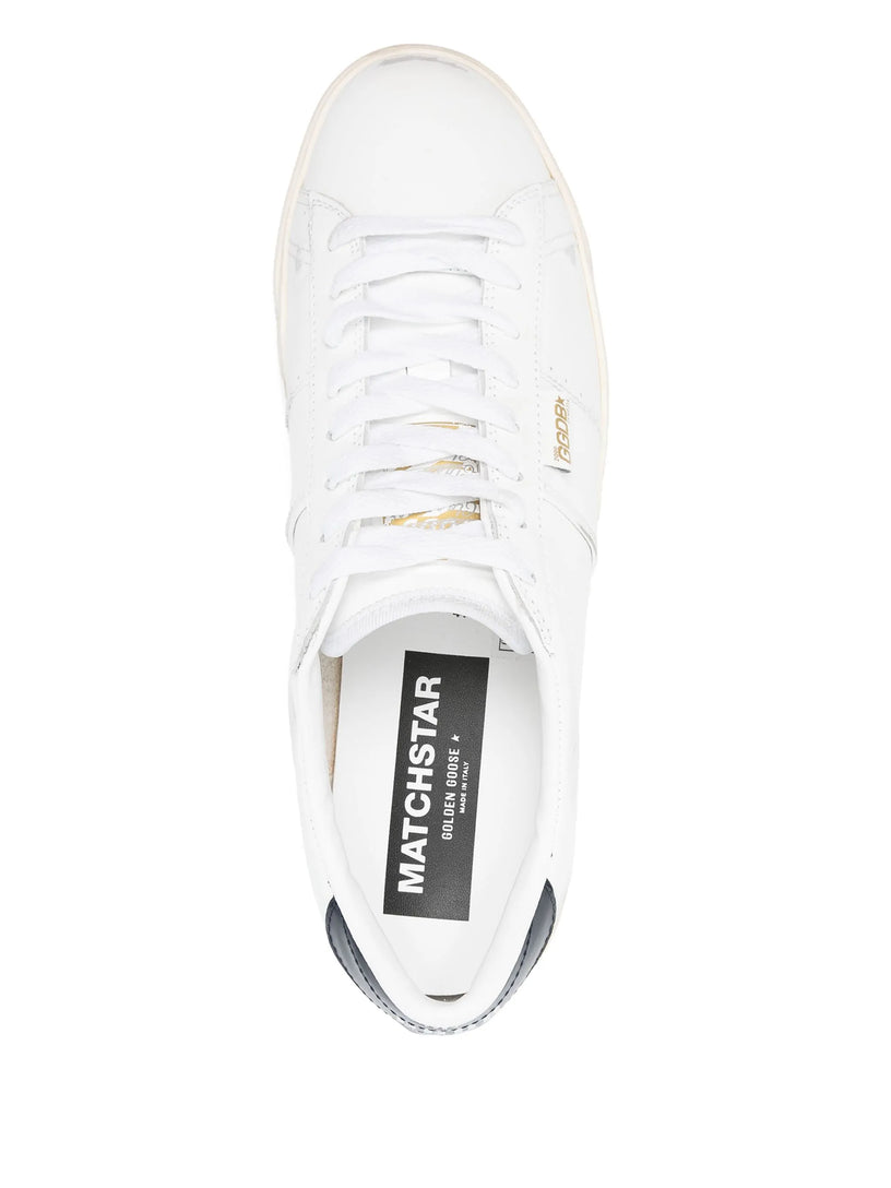 Matchstar in white leather with dark blue leather heel tab