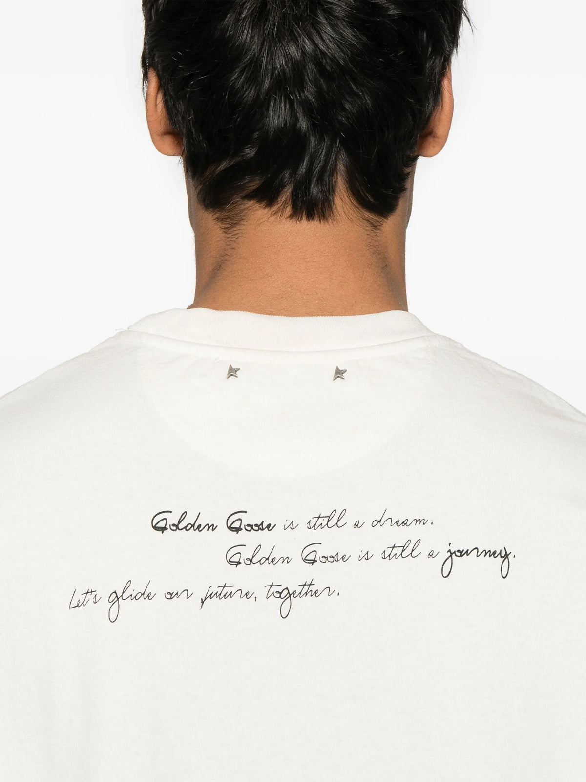 Unisex t-shirt in worn white with printed writing