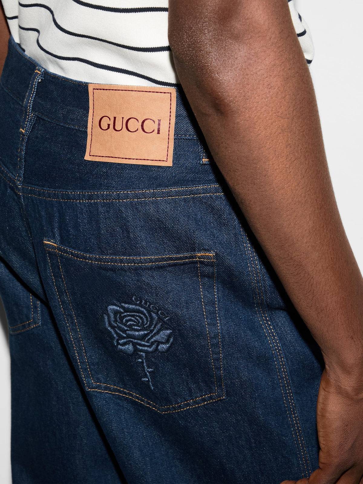 Denim trousers with embroidery