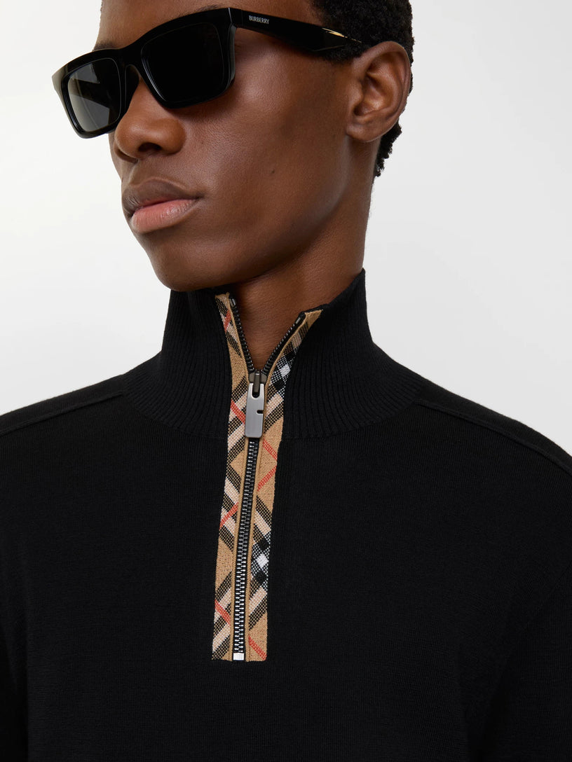 Wool pullover with half zip and check trim