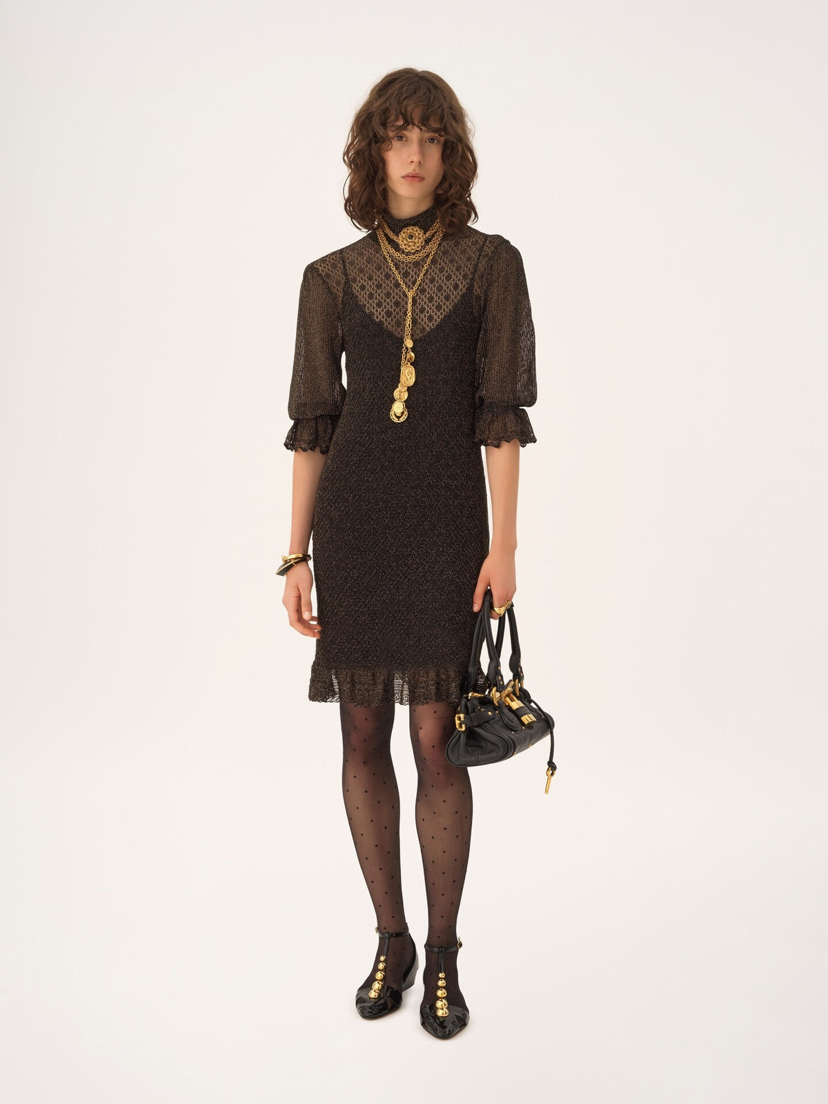 Mini dress with puffed sleeves and ruffles in lurex knit