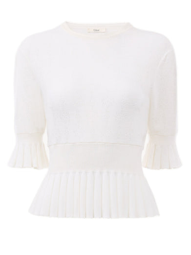 Short wool knit sweater with ruffles