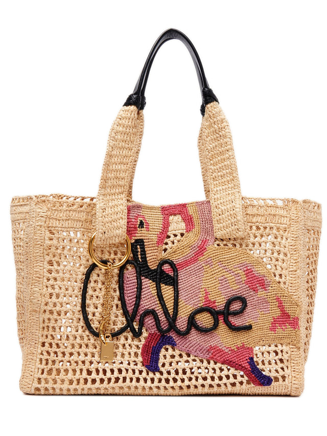 East-West Summer Banana tote bag in raffia