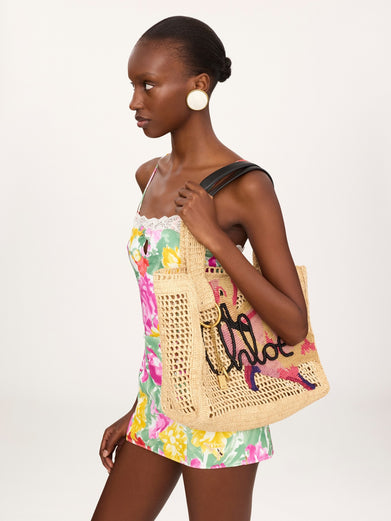 East-West Summer Banana tote bag in raffia