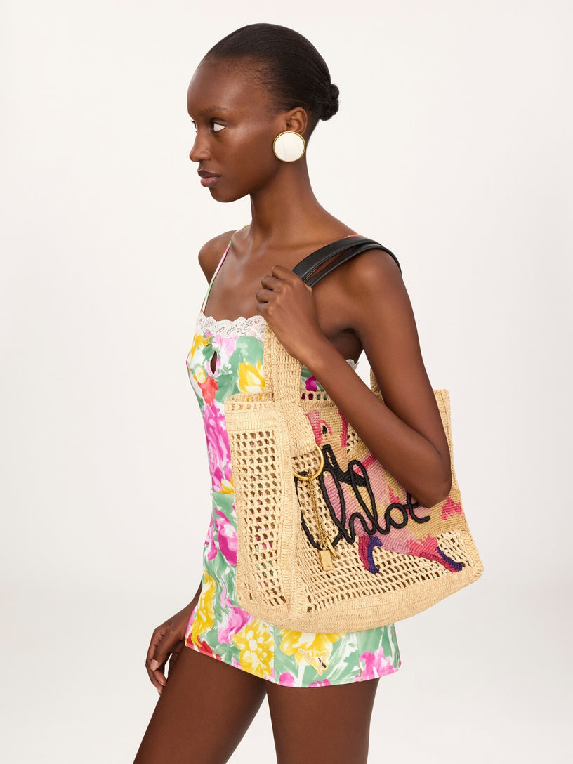 East-West Summer Banana tote bag in raffia