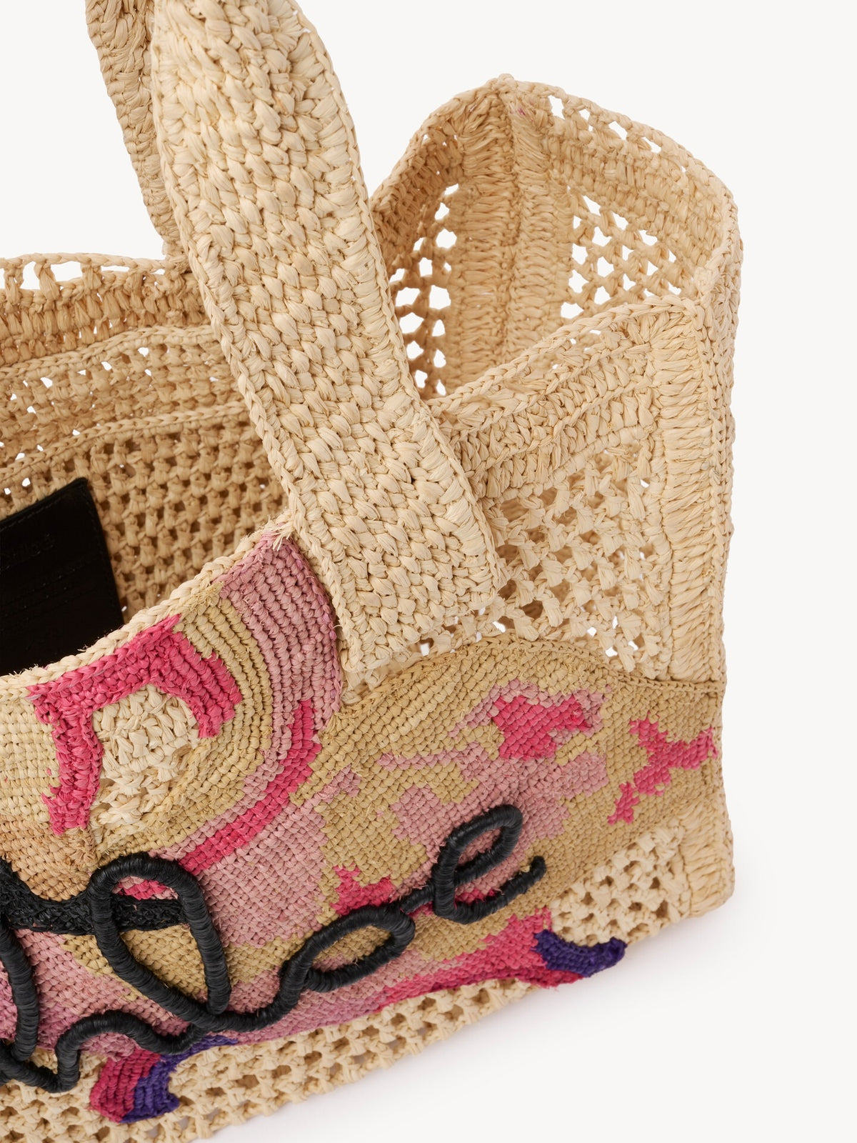 East-West Summer Banana tote bag in raffia