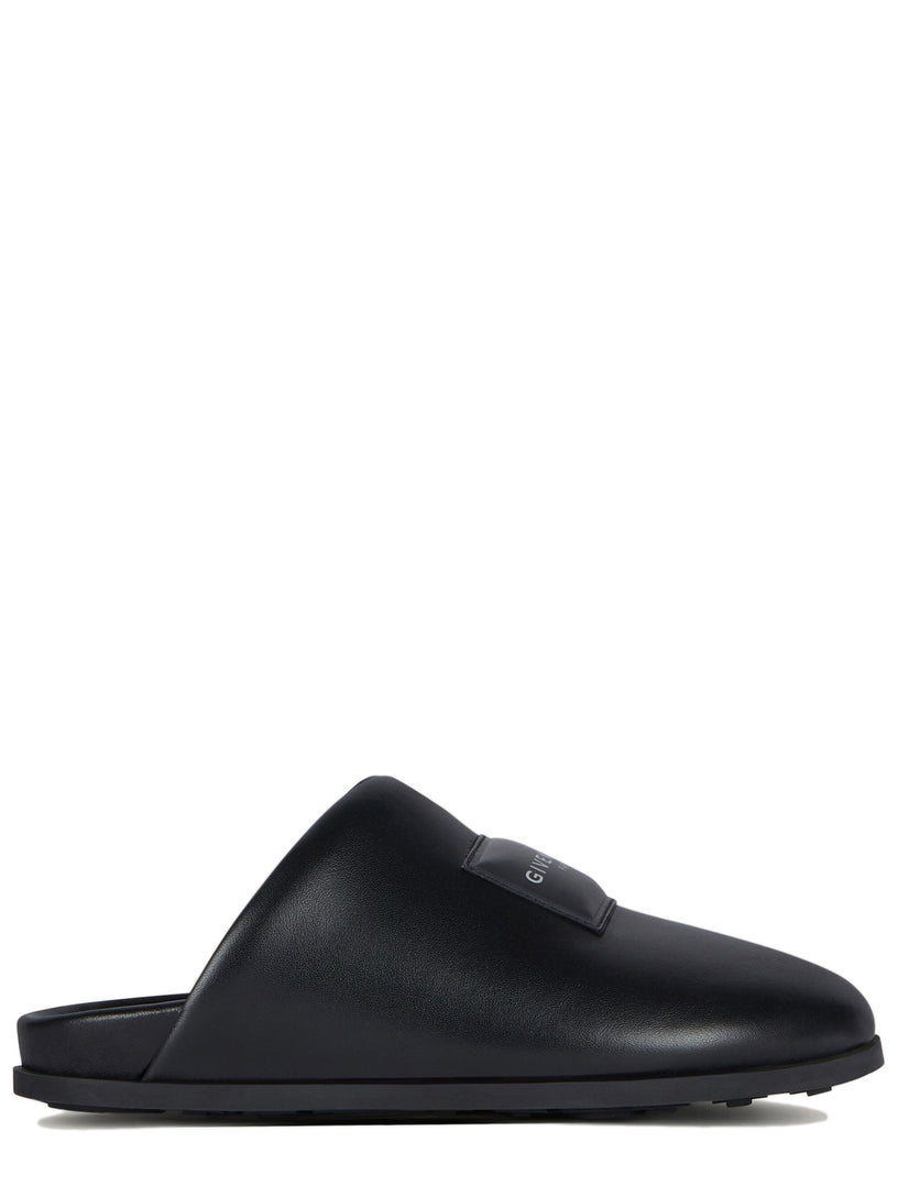 Mule piatte Label in nappa