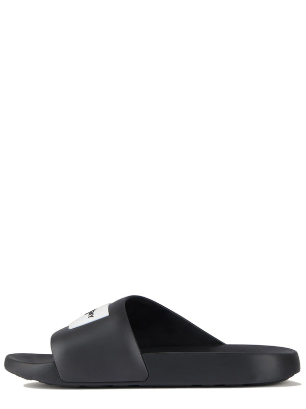 Label Slide mules in rubber