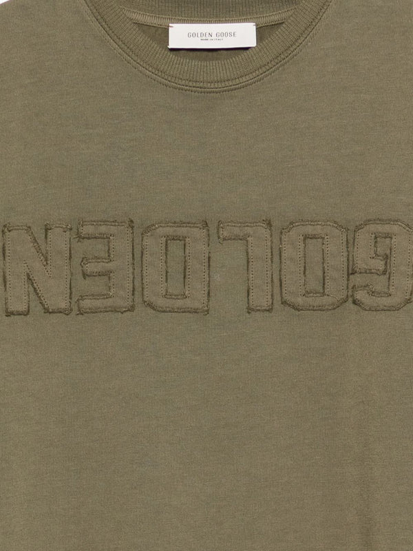T-shirt con logo in rilievo