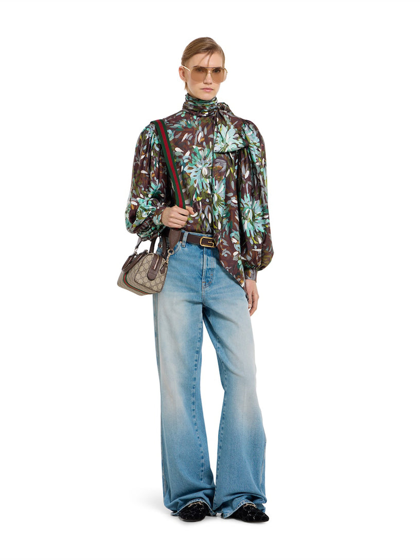 Flared trousers in faded cotton denim