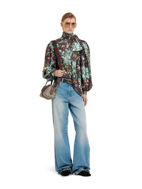 Flared trousers in faded cotton denim