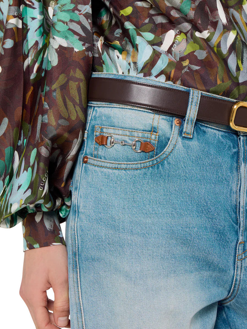 Flared trousers in faded cotton denim