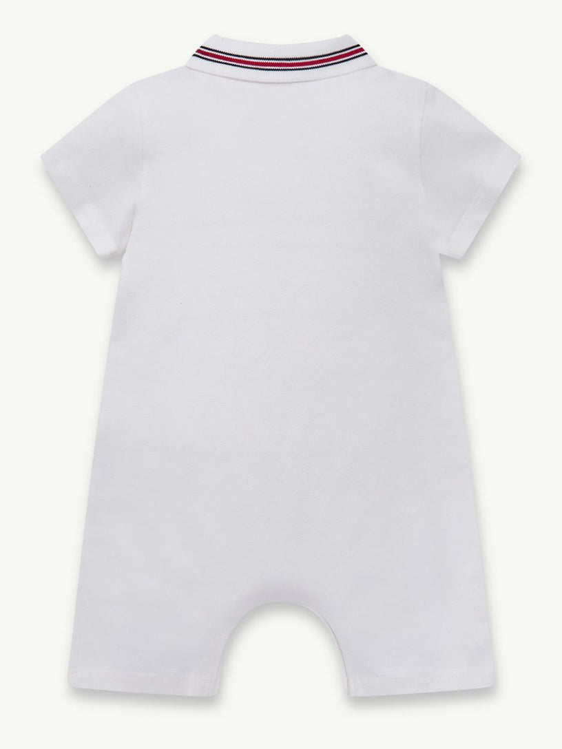 Cotton piquet romper with tricolour hem