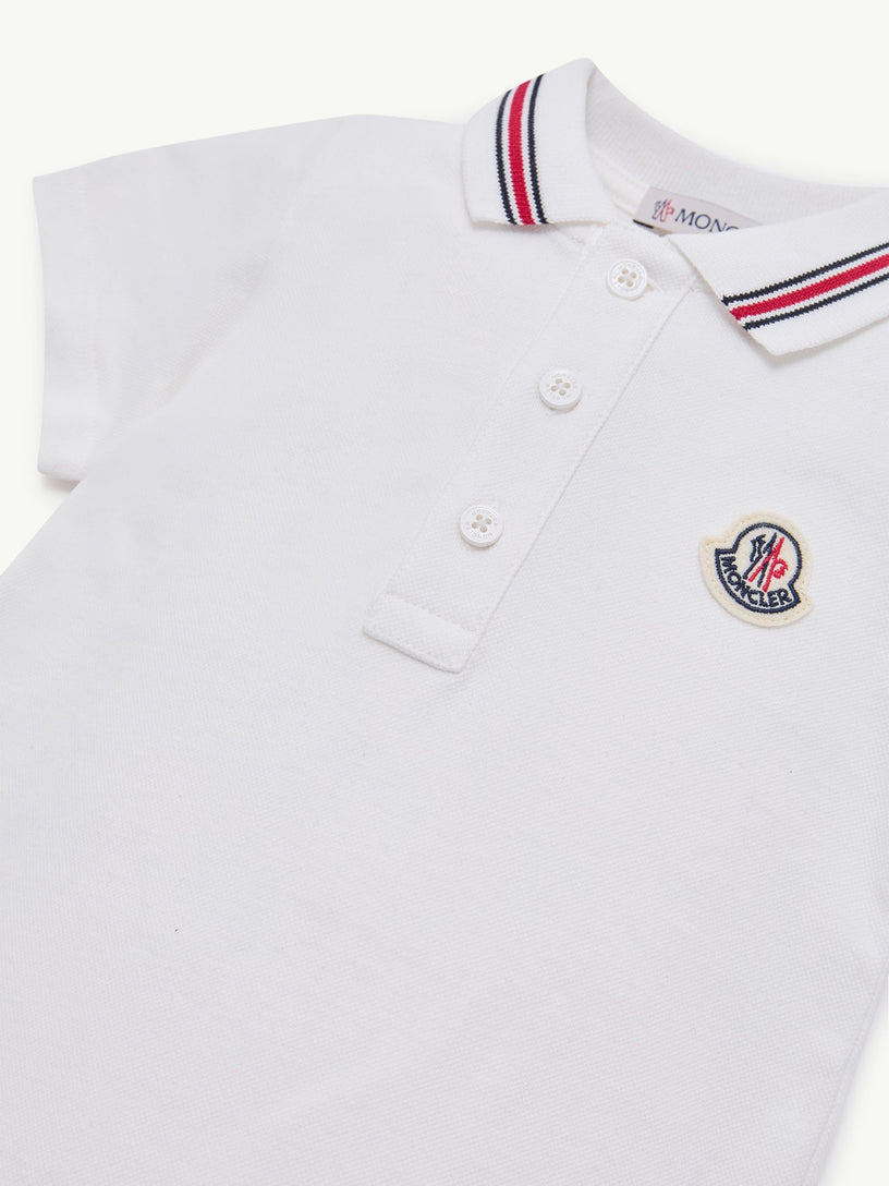 Cotton piquet romper with tricolour hem