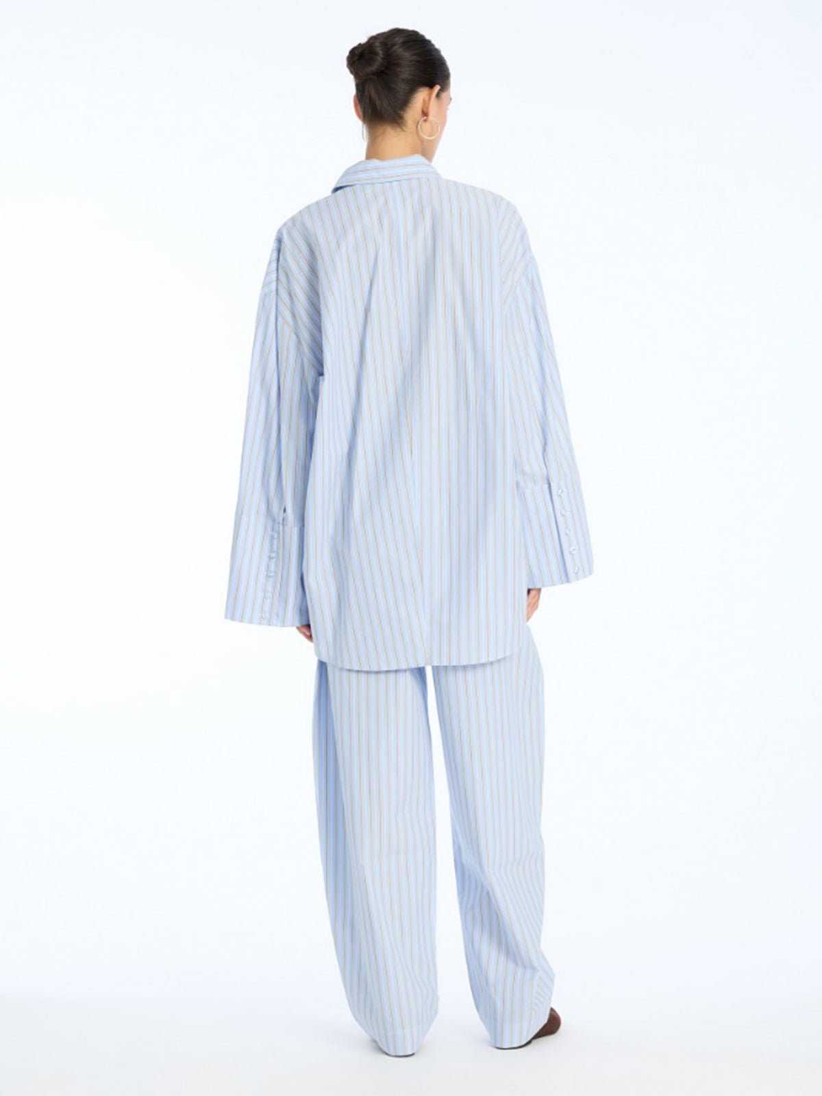 Striped-pattern tapered trousers