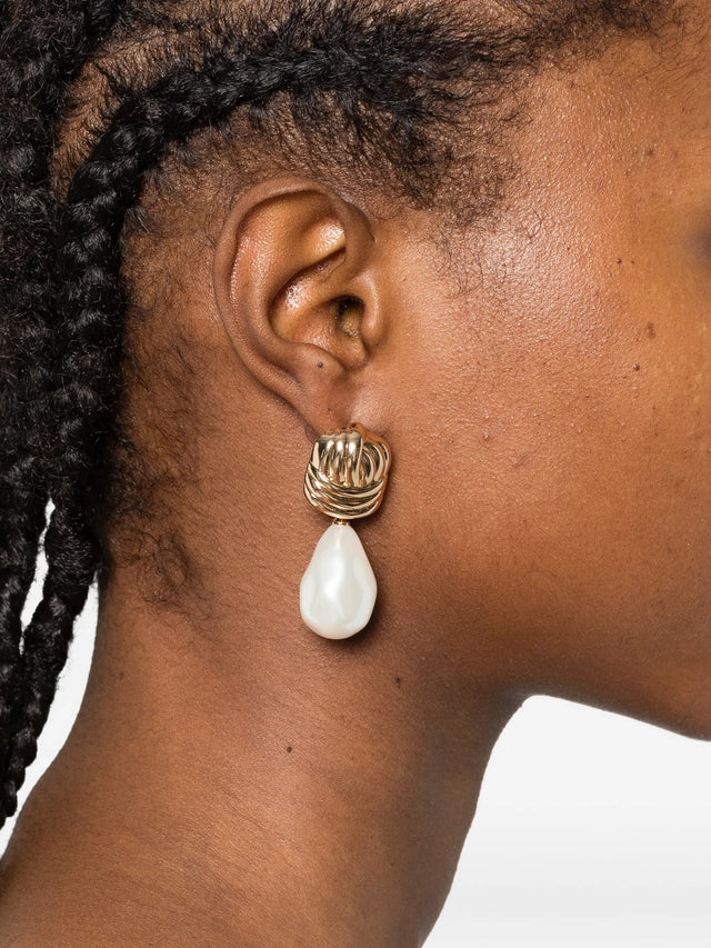 Pearl earrings with golden knot
