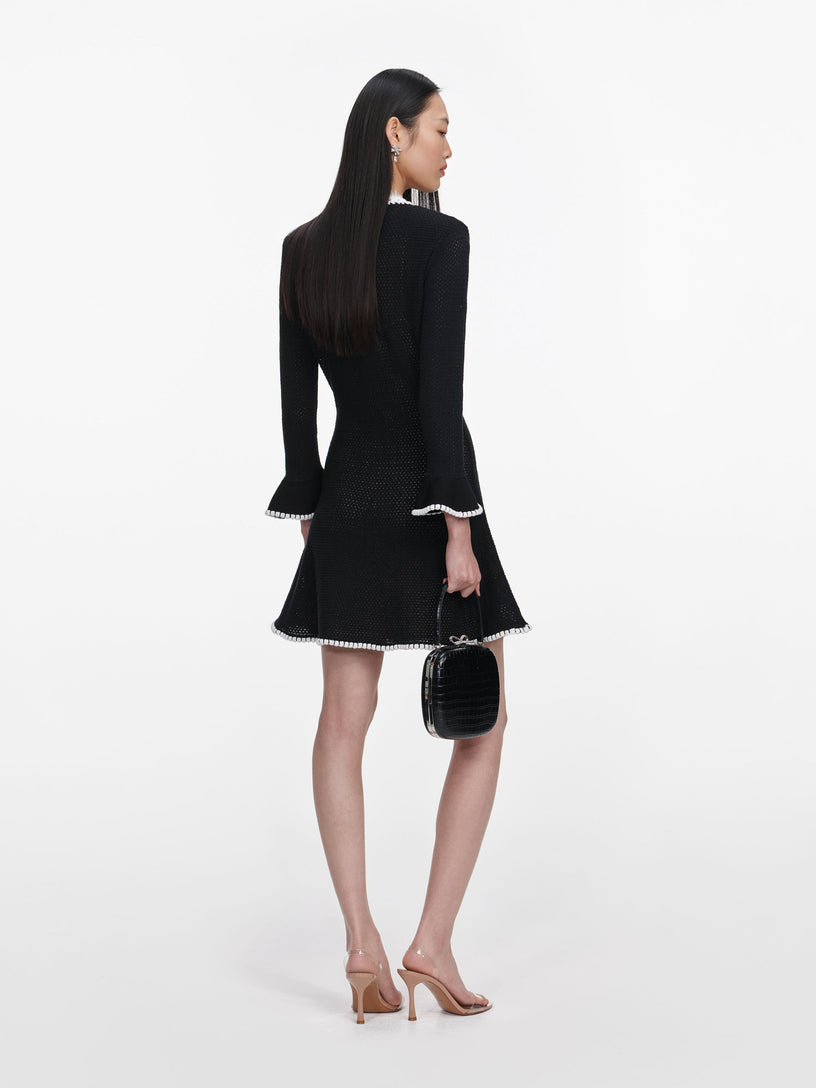 Mini abito in maglia con pizzo
