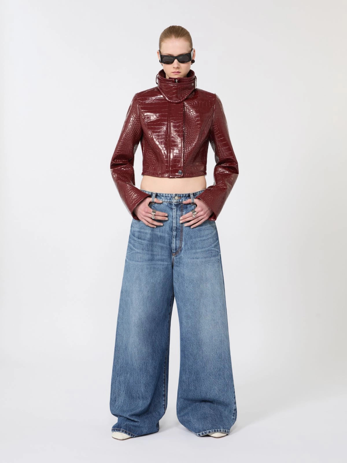 Patent leather cropped jacket with alligator print