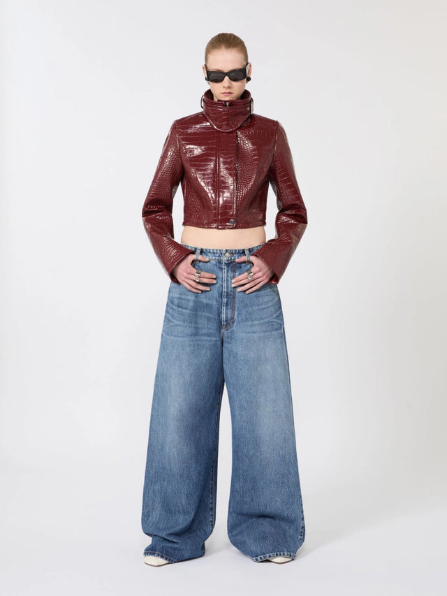 Patent leather cropped jacket with alligator print