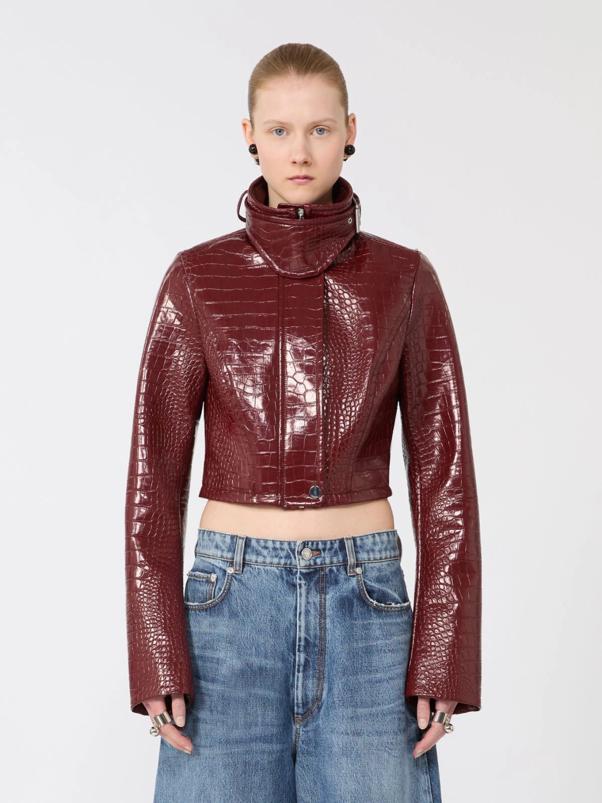 Patent leather cropped jacket with alligator print