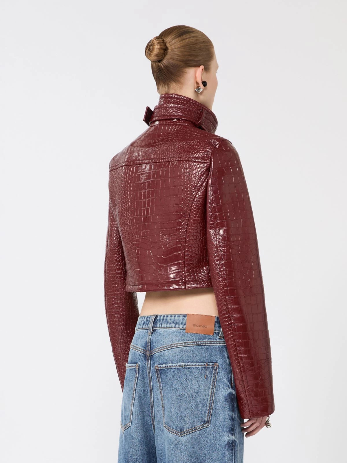 Patent leather cropped jacket with alligator print